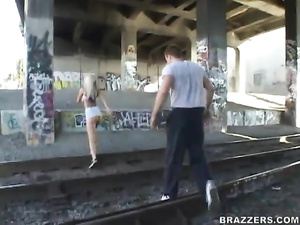 Watch the brutal guy punishing the juicy blonde outdoor. He is penetrating her sweet holes and jizzing on her face next to the painted wall.