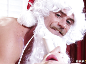 Santa with muscles decides to plow this naughty redhead. He's oiled-up, she's oiled-up and it's bound to be hot. Enjoy this X-mas themed hardcore scene.