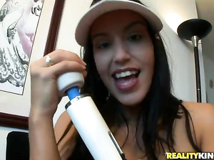 Big white vibrator is what this lovely brunette needs for happiness. She is looking really hot wearing nothing else but black and white  hat.