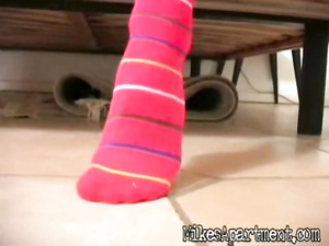 You are going to fall in love with this skinny blonde wearing pink socks. She is torturing her pussy with fingers and massaging her clit.